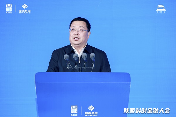 省政协副主席、民建陕西省委会主委李忠民出席会议并致辞。.jpg
